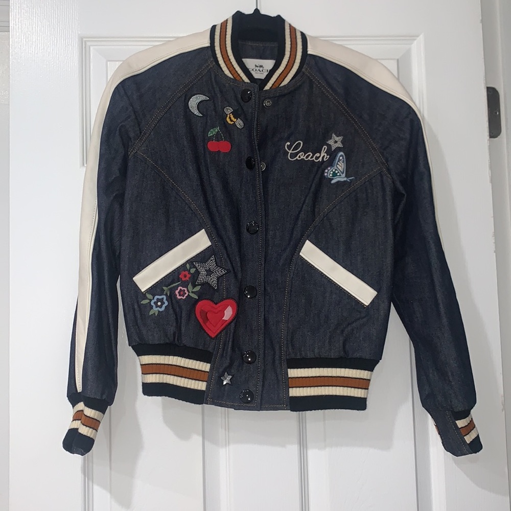 Denim and Leather coach varsity jacket with patches. New with tags.